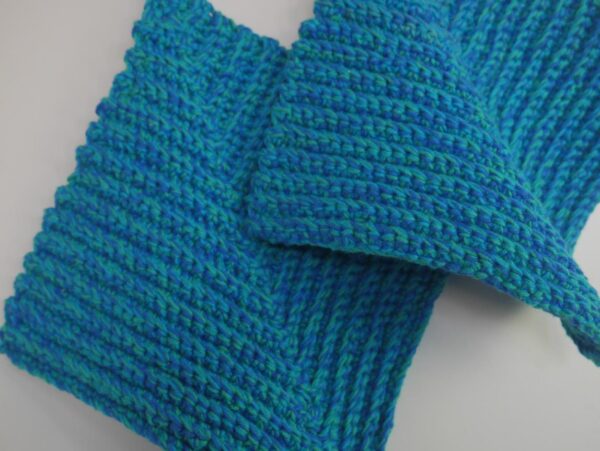 blue crotcheted pot holder of two types