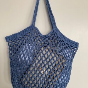 blue crotcheted filled bag