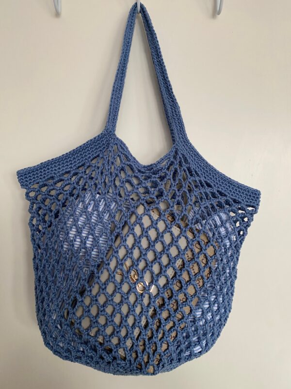 blue crotcheted filled bag